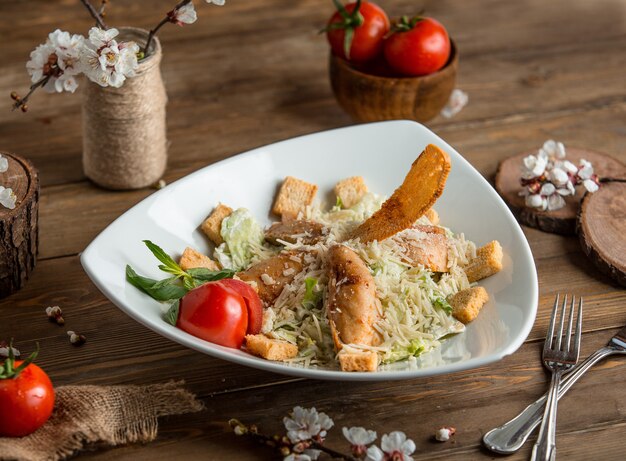 chicken ceasar salad on the table 