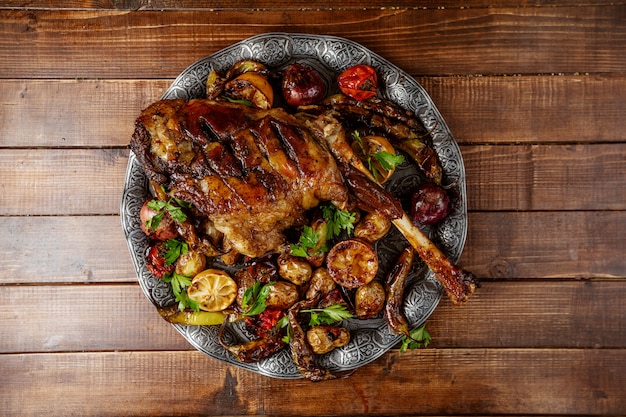 Chicken grill with vegetables on the table