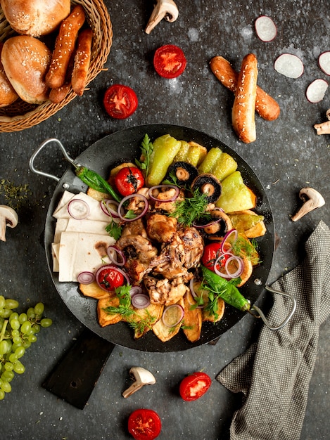 Chicken sage with potatoes, bell pepper, mushrooms