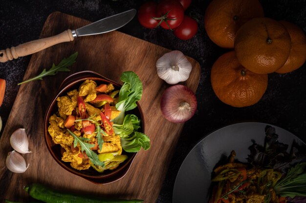 Chicken Stir Fried Chili Along with bell pepper, tomatoes and carrots