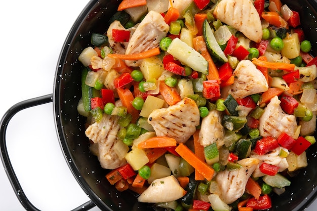 Chicken stir fry and vegetables isolated on white background