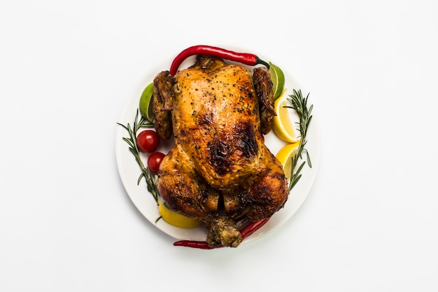 Free photo chicken with citruses and spices on white