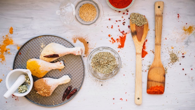 Free Photo chicken with spices on tray