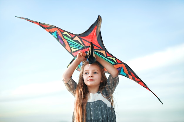 Child having fun with kite