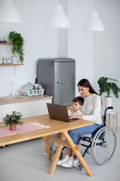 Child helping his disabled mother