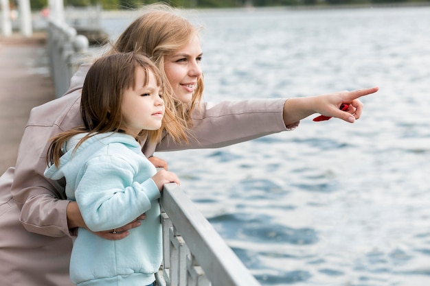 Child and mother by the seaside