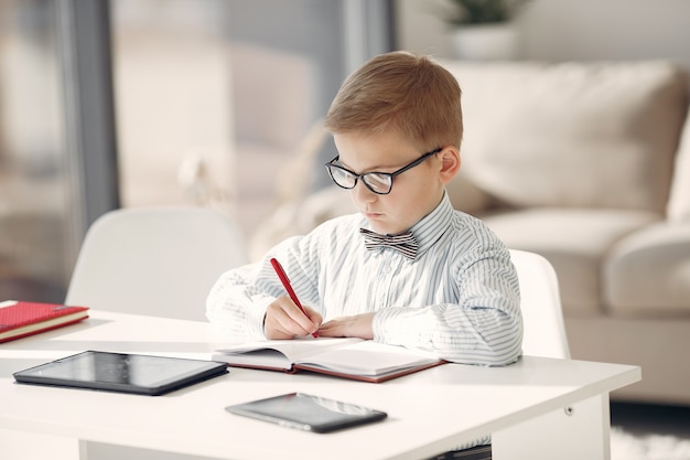 Child at the office with a laptop