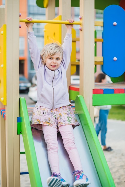 Free photo child on playground outside