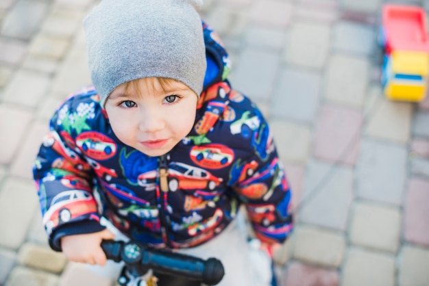 Child playing outside on playground