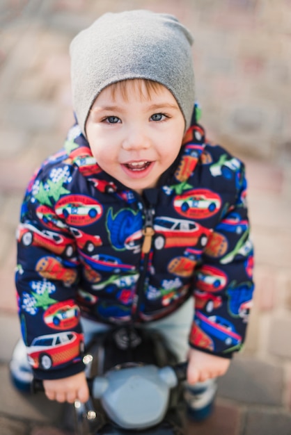 Child playing outside on playground