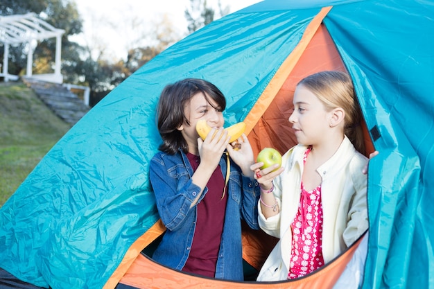 Child playing with a banana