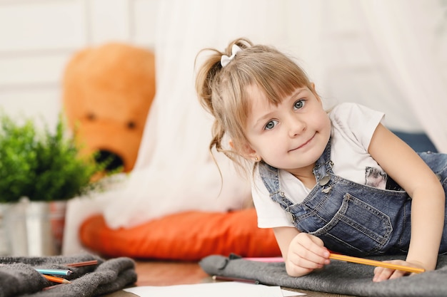 Free photo childhood. young girl at home