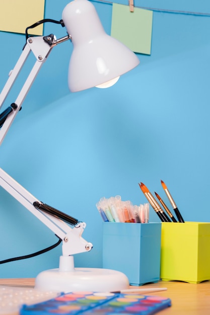 Free photo children desk with a lamp