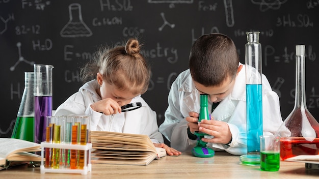 Children doing experiments in laboratory