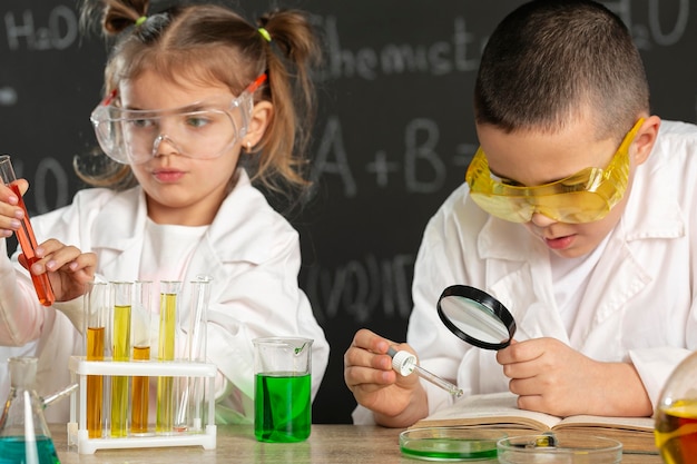 Children doing experiments in laboratory