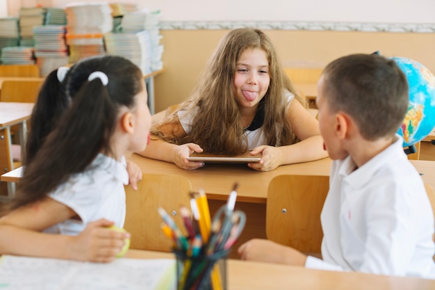 Free Photo children grimacing in class