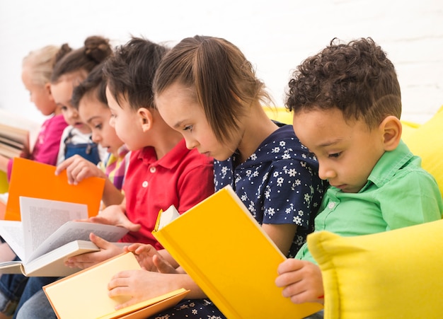 Free photo children group reading books