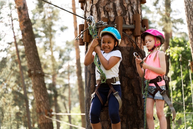 Free photo children having fun at an adventure park