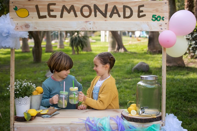 Free photo children having lemonade stand