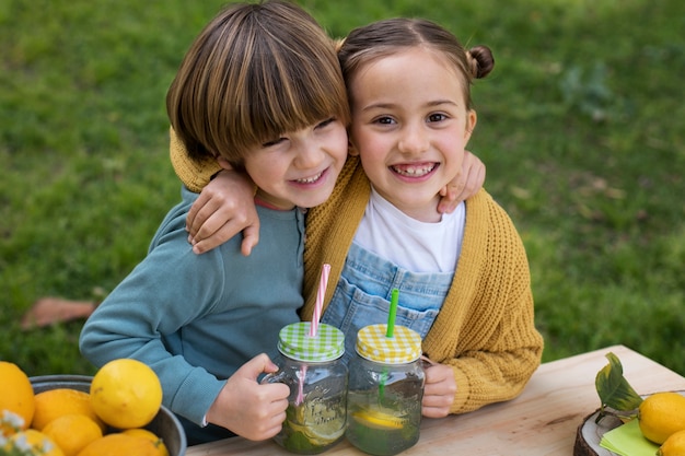 Free photo children having lemonade stand