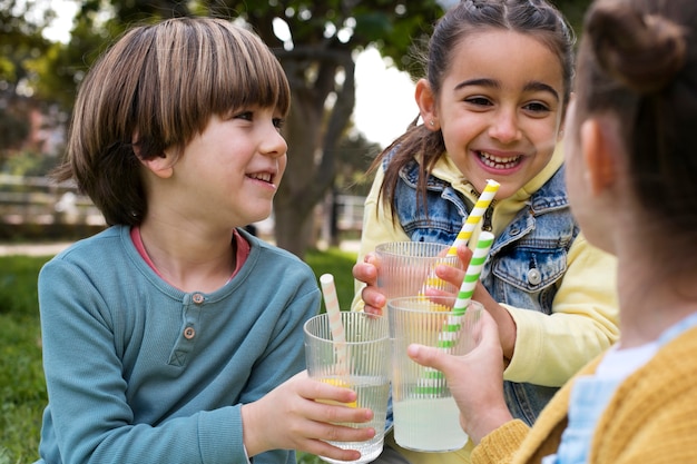 Free photo children having lemonade stand