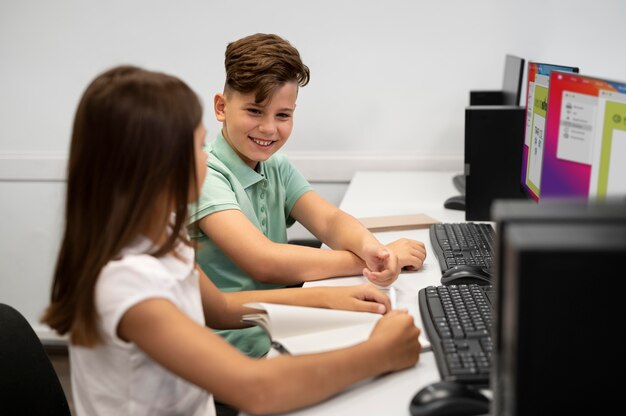 Children having technology education class