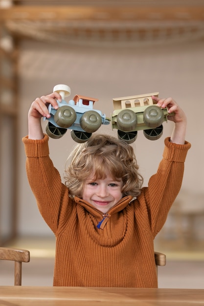 Free photo children playing with eco toys