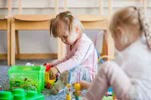 Free photo children in preschool playing