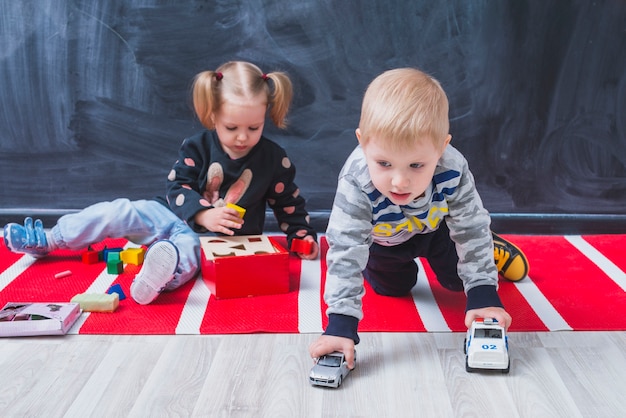 Free photo children spending time on floor