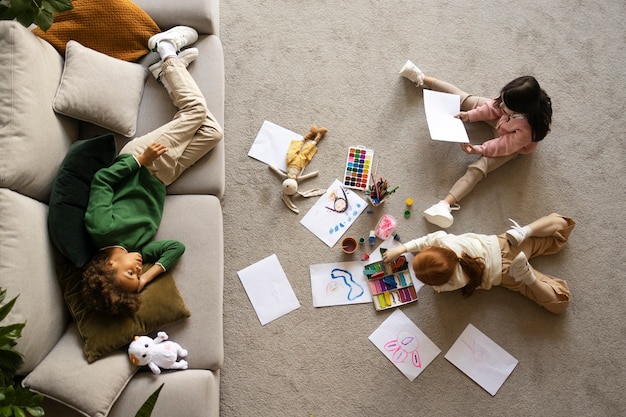 Free Photo children spending time together in the comfort of their home