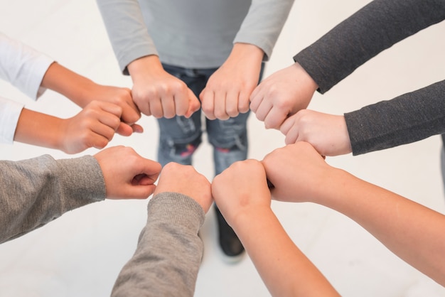 Free Photo children with their hands together