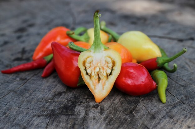 Chili peppers on wooden background