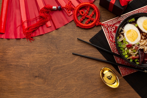 Chinese new year dish with chopsticks