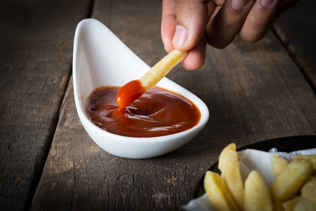 Free Photo chip shop chip dripping tomato ketchup.