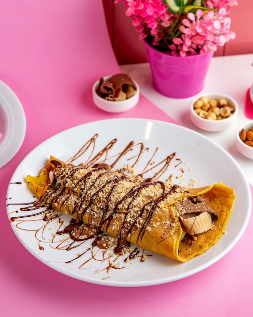 Free Photo choco doner chocolate wrapped in pancake on plate