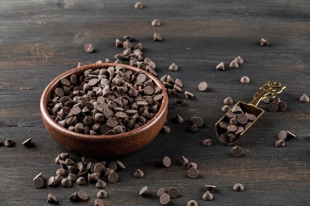 Choco drops in a bowl with scoop