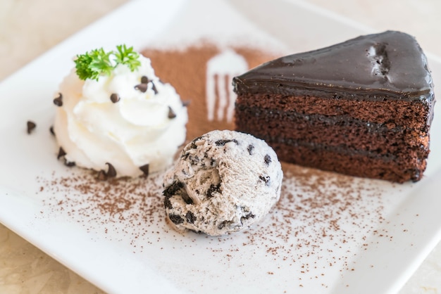 chocolate cake with ice-cream and whipped cream