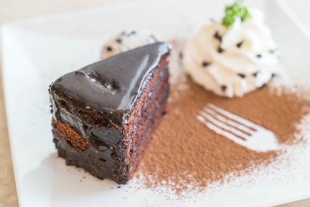 chocolate cake with ice-cream and whipped cream