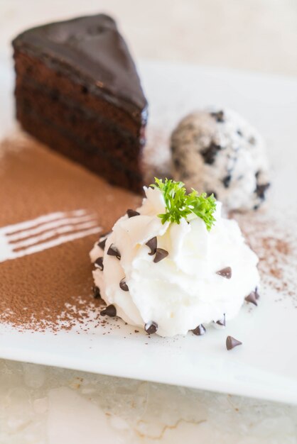 chocolate cake with ice-cream and whipped cream