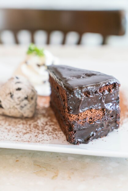 chocolate cake with ice-cream and whipped cream