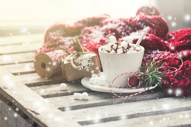 Chocolate cup with marshmallows and christmas decorations