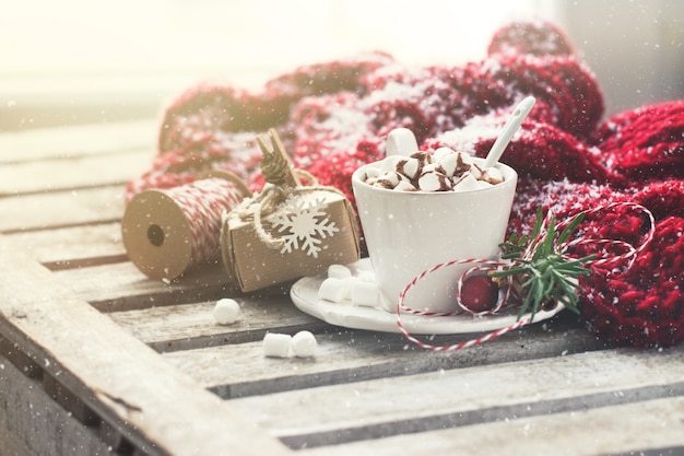 Chocolate cup with marshmallows and christmas decorations