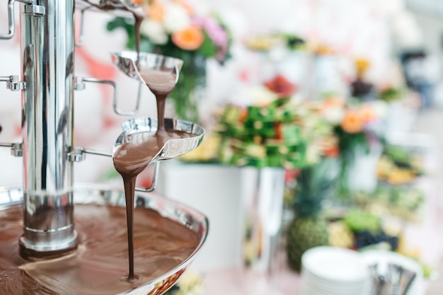 Free photo chocolate fountain in a restaurant for celebrating guests