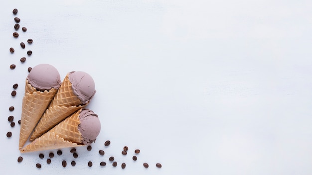 Free photo chocolate ice cream cones on white background