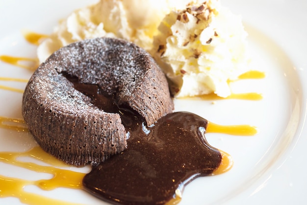 Chocolate lava cake in white plate