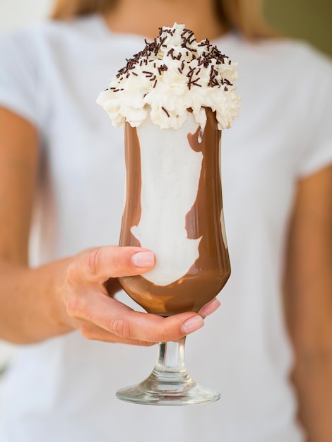 Free Photo chocolate milkshake with whipped cream