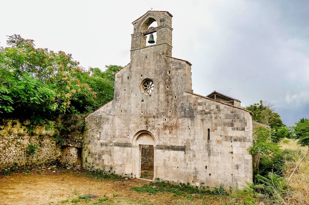 Christian Church surrounded by trees in Bussi, Italy