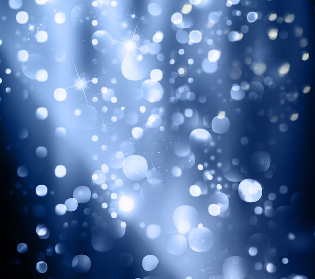 Christmas background of bokeh lights and stars