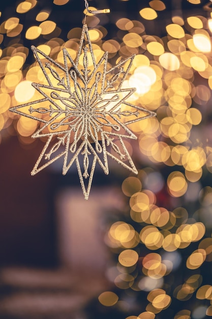 Free Photo christmas background with decorative snowflake with bokeh lights