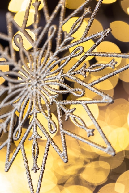 Free Photo christmas background with decorative snowflake with bokeh lights